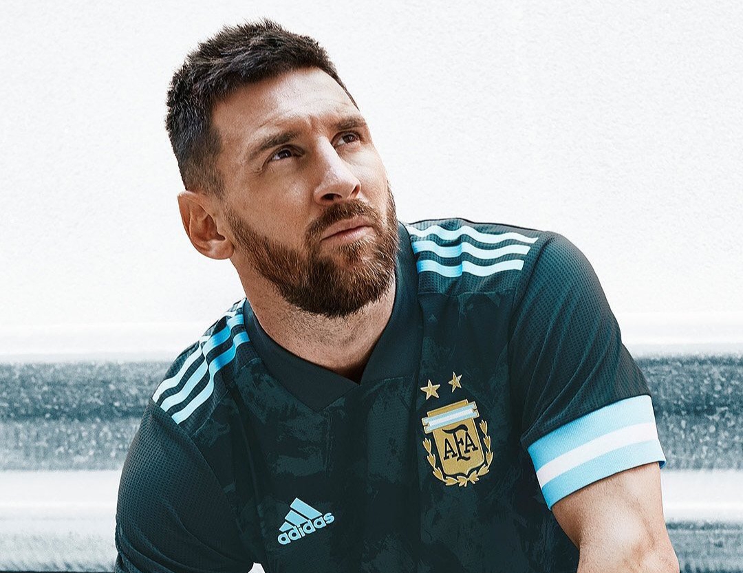Lionel Messi wears kit 